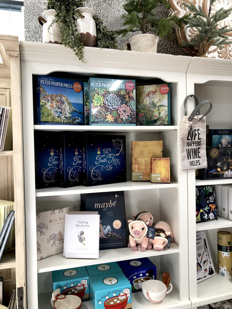 Puzzle and book display at Paper Habit gift shop