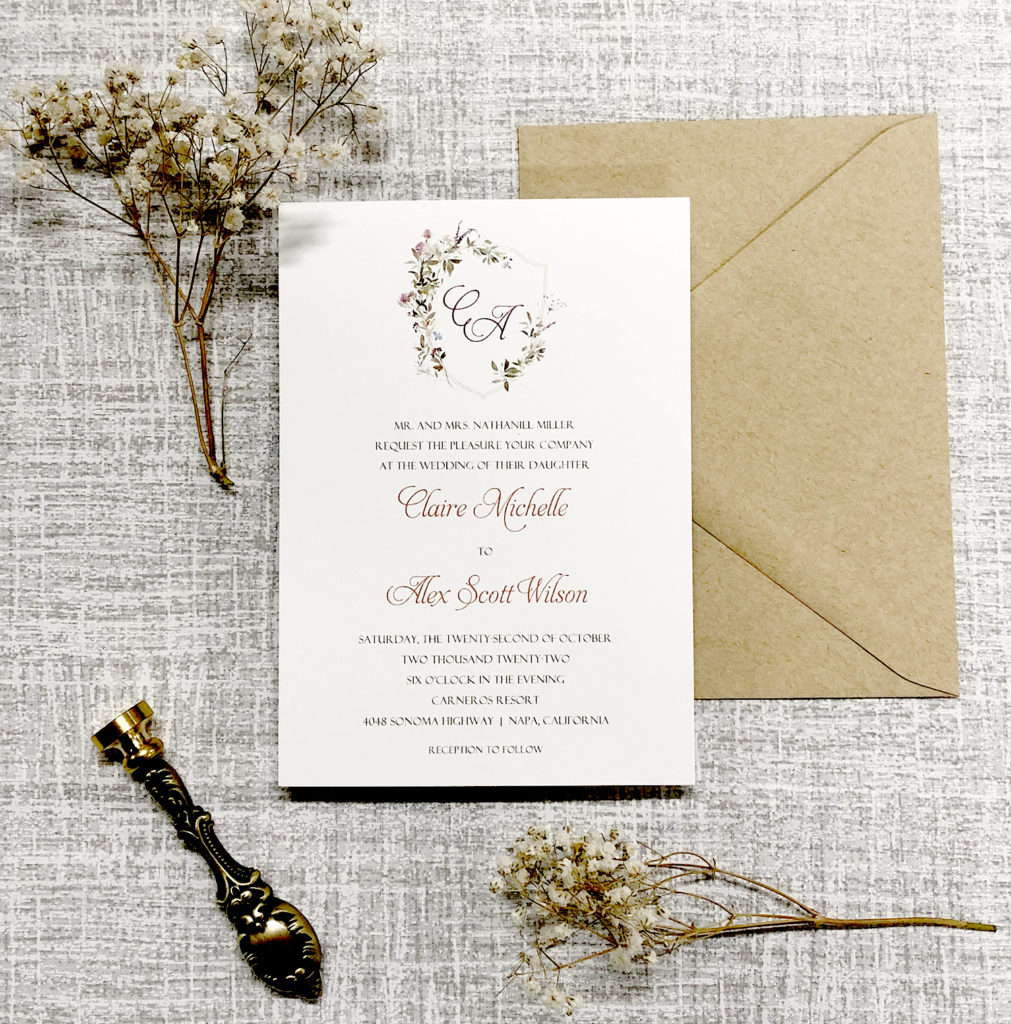 Wildflower wedding invitations with watercolor crest