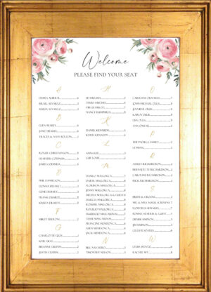 Soft pink flowers on a seating chart for a wedding or event