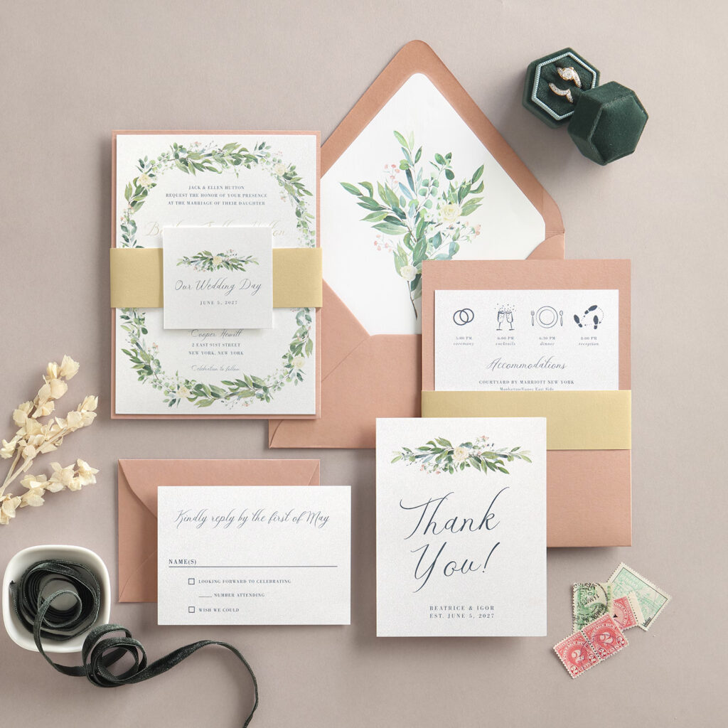 Garden Party wedding invitation with flowers and a coral pocket